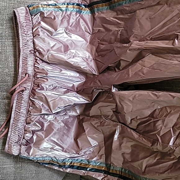 Pants they are brand new, rose color with stripes down the side. - Picture 1 of 10